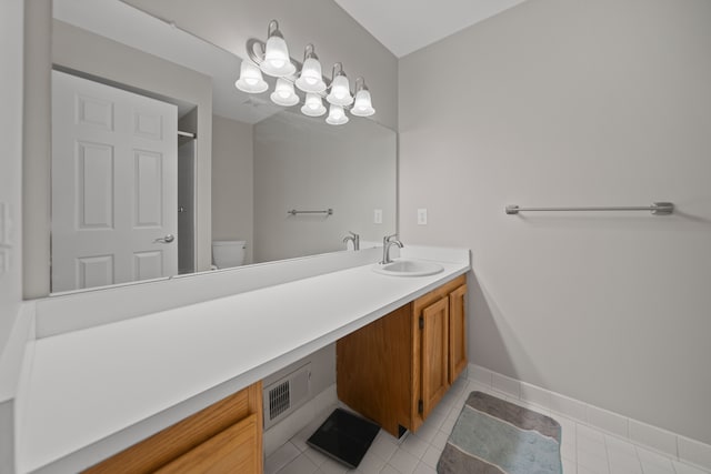 full bathroom with vanity, visible vents, baseboards, tile patterned flooring, and toilet