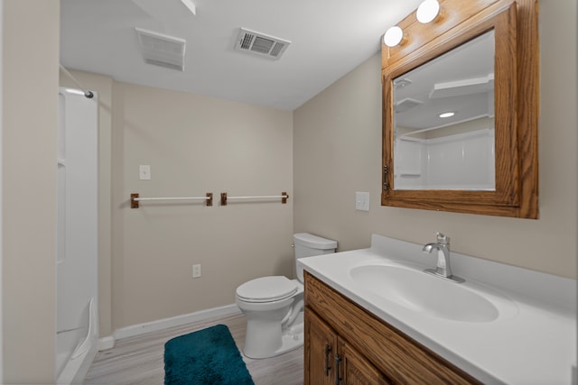 full bath featuring visible vents, baseboards, toilet, wood finished floors, and a shower