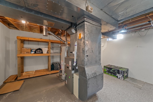 unfinished basement with heating unit and water heater