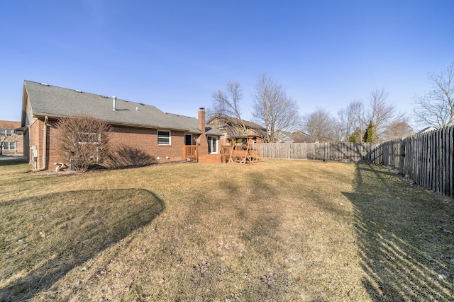 view of yard with a fenced backyard