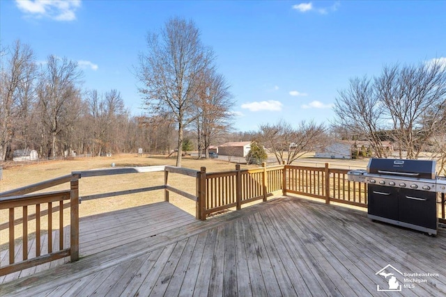 wooden terrace with area for grilling