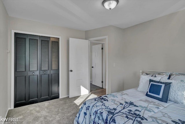 bedroom featuring a closet and carpet