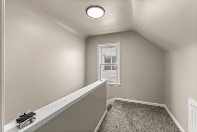 19124 Harman St, Melvindale, MI 48122 - bonus room with vaulted ceiling, visible vents, baseboards, and carpet floors
