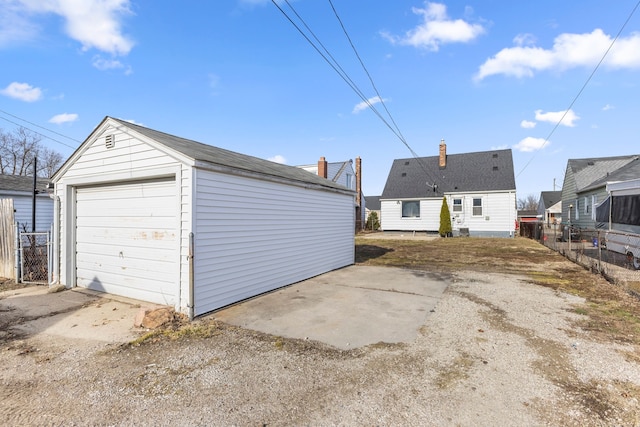 19124 Harman St, Melvindale, MI 48122 - detached garage featuring fence and driveway