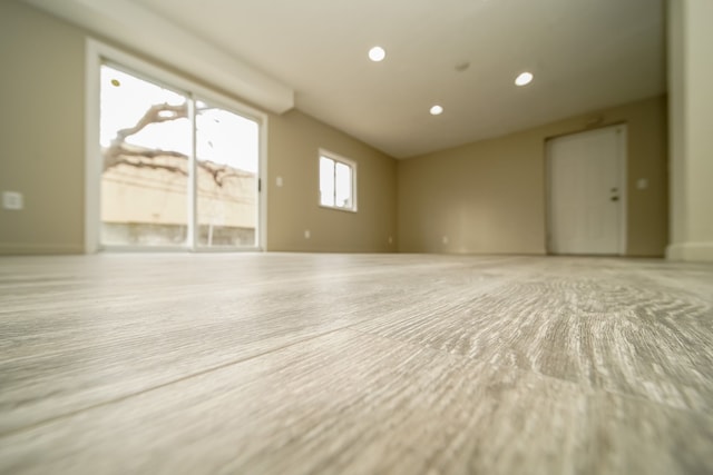 unfurnished room featuring recessed lighting and light wood finished floors