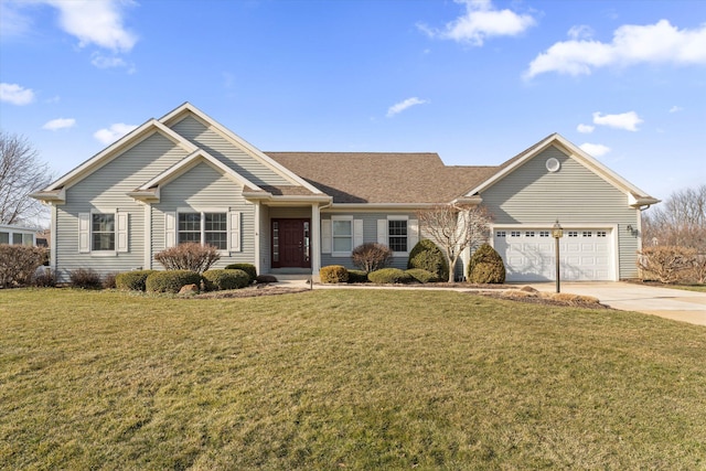 view of front facade featuring a garage, driveway, and a front lawn