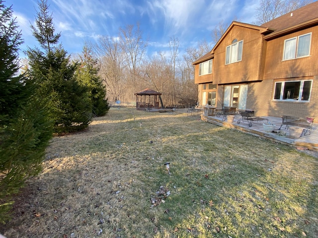 view of yard with a gazebo and a patio area