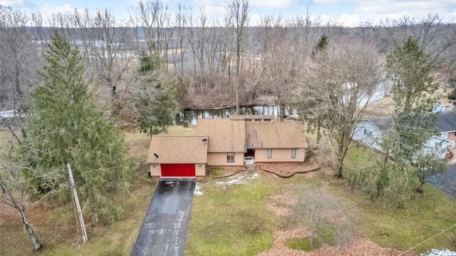 drone / aerial view with a forest view