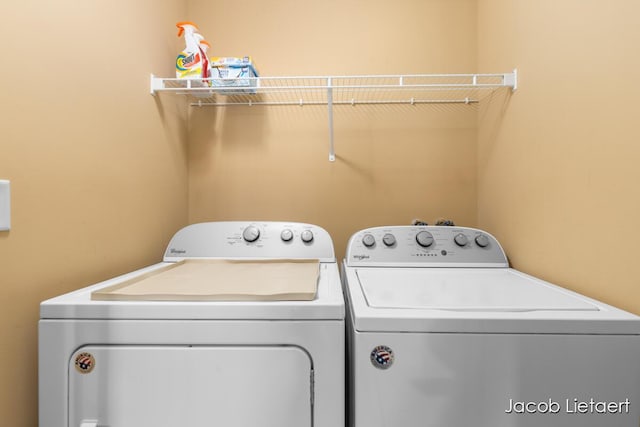 laundry room featuring independent washer and dryer and laundry area