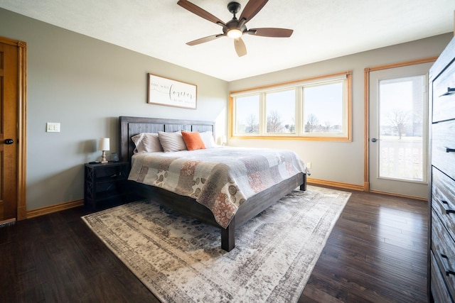 bedroom with dark wood finished floors, baseboards, and ceiling fan