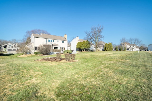 view of yard with a residential view