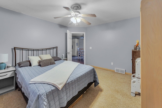 bedroom featuring visible vents, ceiling fan, and baseboards