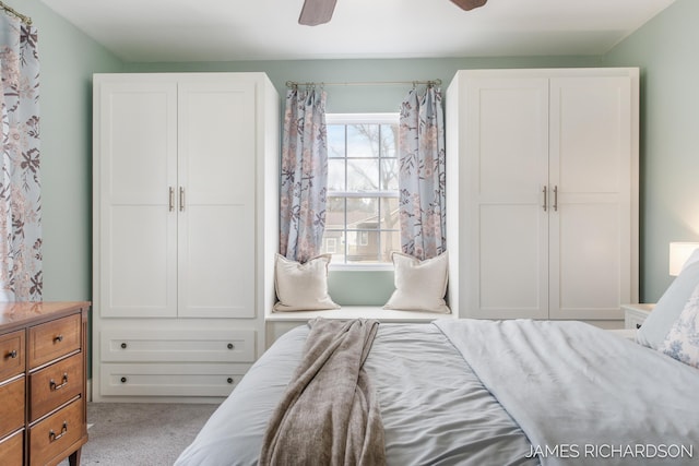 carpeted bedroom featuring ceiling fan