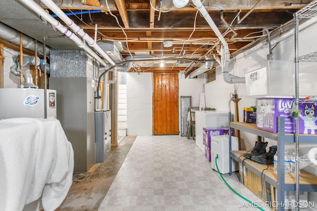 unfinished basement with tile patterned floors and water heater