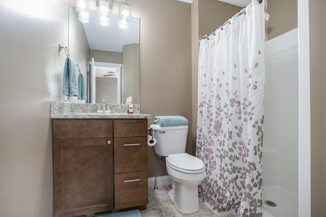 full bathroom with vanity, toilet, and a shower with shower curtain