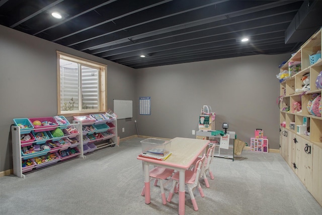 recreation room featuring carpet flooring, recessed lighting, and baseboards