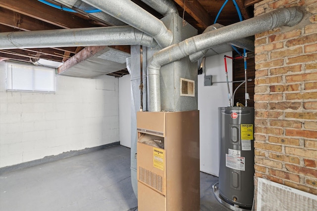 utility room with visible vents and electric water heater