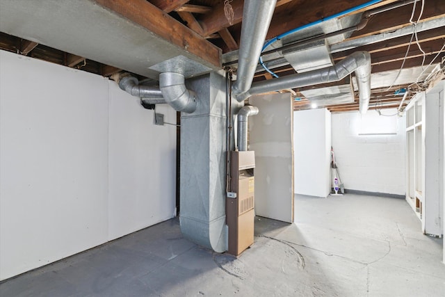 basement featuring heating unit