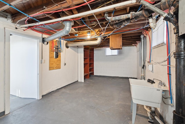 basement featuring a sink