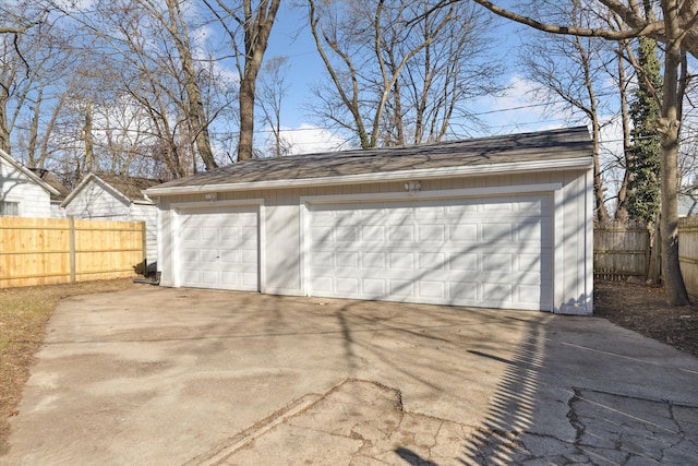 detached garage with fence