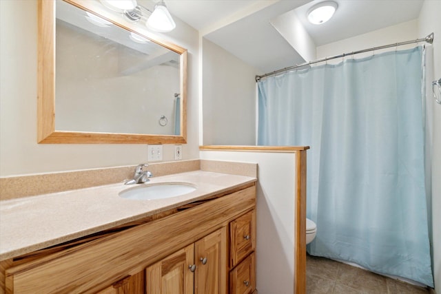 full bathroom featuring tile patterned floors, curtained shower, toilet, and vanity