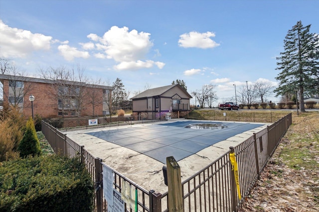 pool featuring a patio and fence