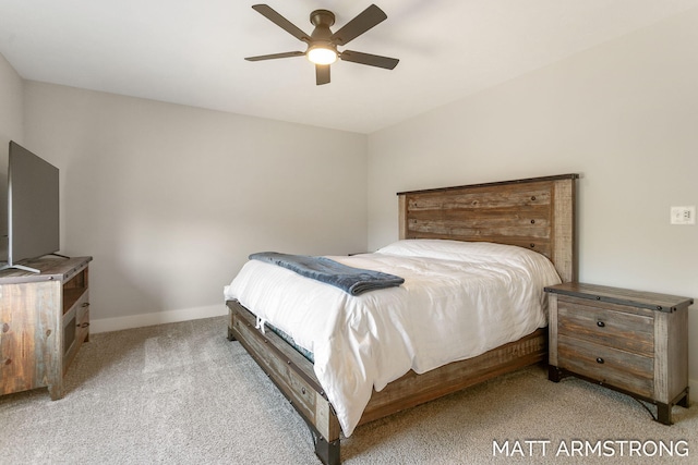 bedroom with baseboards, carpet, and ceiling fan