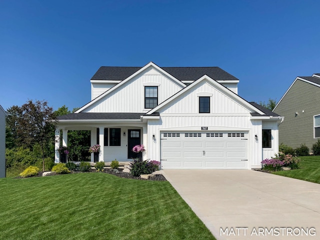 modern inspired farmhouse featuring driveway, an attached garage, covered porch, a front lawn, and board and batten siding