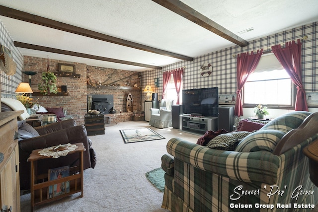 carpeted living room featuring visible vents, a textured ceiling, and a healthy amount of sunlight