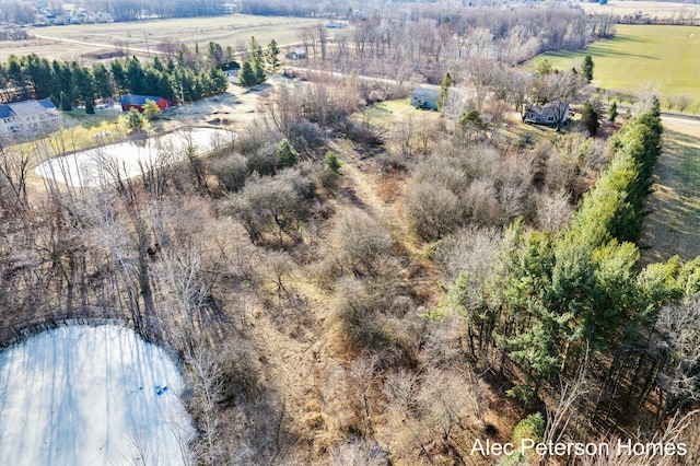 birds eye view of property featuring a rural view