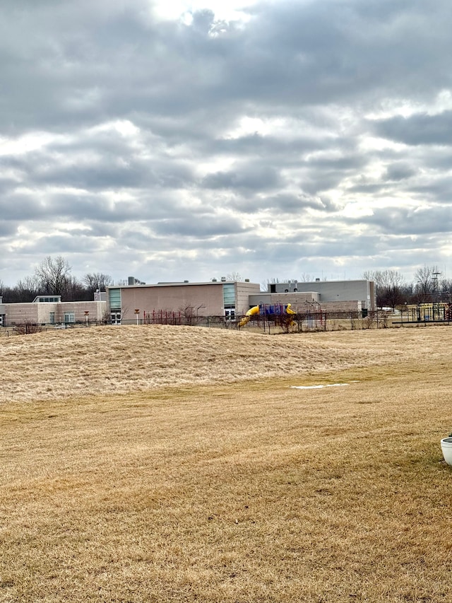 view of yard with a rural view