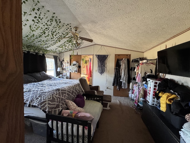 bedroom featuring a textured ceiling, carpet, and vaulted ceiling