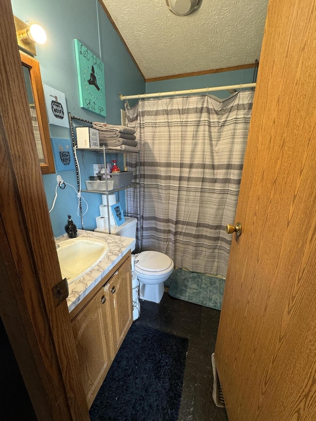 full bathroom with toilet, curtained shower, a textured ceiling, and vanity