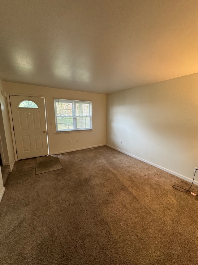 45577 Kensington St, Utica, MI 48317 - carpeted foyer with baseboards