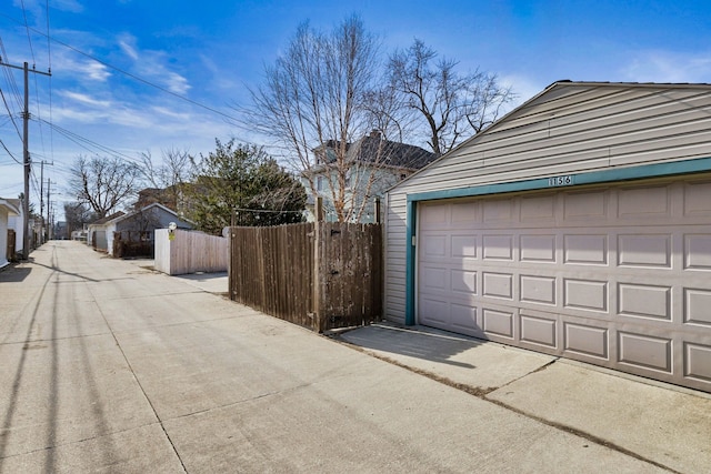 garage featuring fence