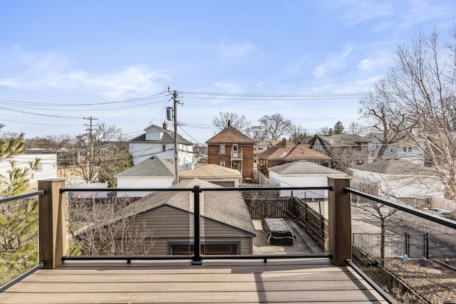 wooden deck featuring a residential view