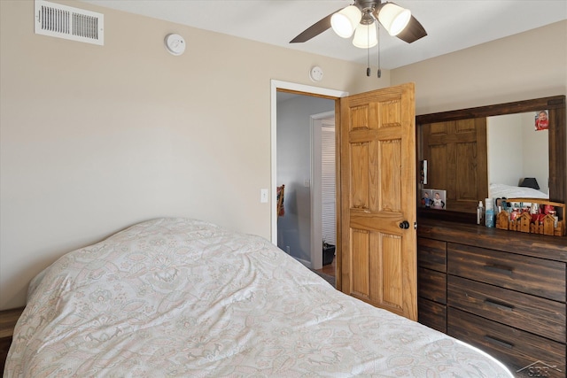 bedroom featuring visible vents and ceiling fan