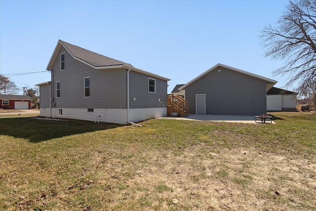 back of property featuring a patio and a yard