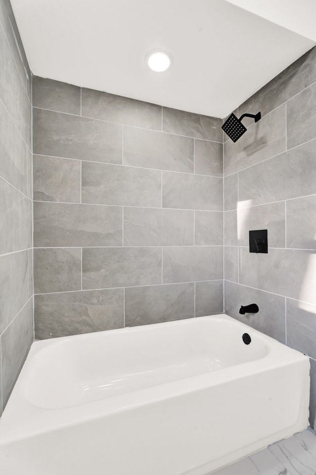 bathroom featuring marble finish floor