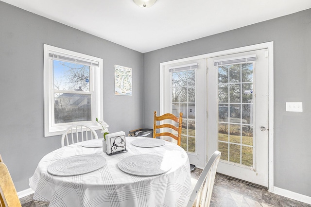 dining room featuring baseboards