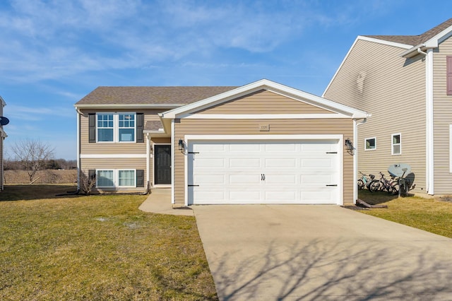 view of front facade with an attached garage, driveway, and a front lawn