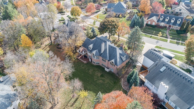 birds eye view of property with a residential view