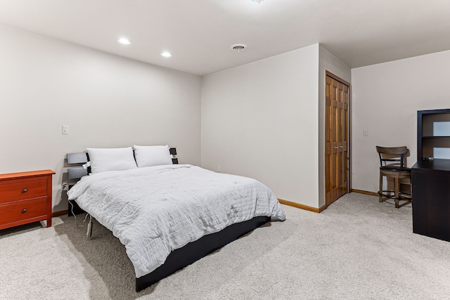 carpeted bedroom featuring visible vents, recessed lighting, and baseboards