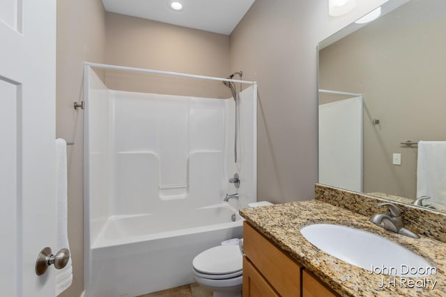 full bath with shower / bathing tub combination, toilet, and vanity