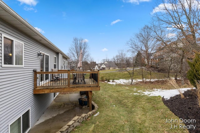 view of yard with a wooden deck