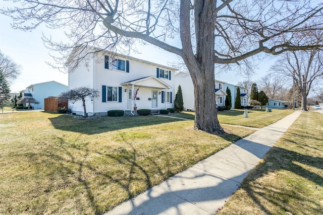 view of front of home featuring a front lawn