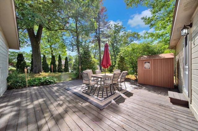 wooden deck featuring outdoor dining space