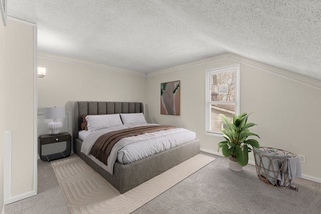 carpeted bedroom featuring vaulted ceiling, baseboards, and a textured ceiling