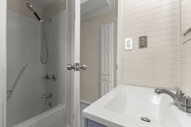 bathroom featuring vanity and tub / shower combination