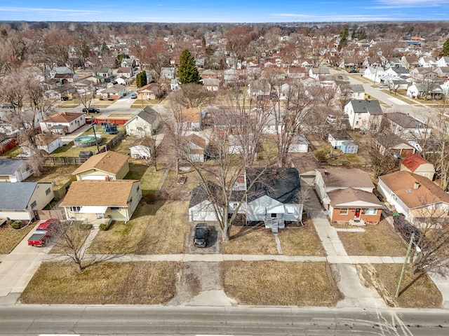 birds eye view of property with a residential view